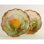 A pair of Royal Doulton cabinet plates: Hand painted with fruit by H Piper, diameter 23cm. (2)