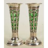 Pair of silver vases with green glass liners: Hallmarked for Sheffield 1909, 147g. (2)