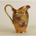 A Royal Worcester milk jug decorated all over with fruit by E Townsend: Height 13cm.