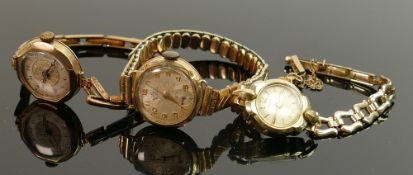 Three vintage gold ladies wristwatches: Comprising two 9ct gold cased examples and one rolled