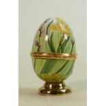 Moorcroft enamelled lidded egg decorated with Daffodils: Height 6.5cm.