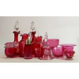 A collection of Cranberry & Ruby glass items to include: Decanters, bowls, jugs etc.