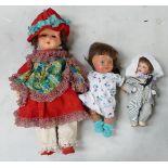 Three composite & pottery headed dolls: Height of tallest 48cm. (3)