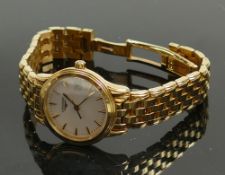 Longines 18ct gold ladies wristwatch: with 18ct bracelet, 65.5g,spare links and insurance