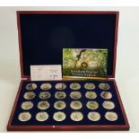 A collection of Windsor Mint set of proof coins: European Songbirds collection, gold-plated set of