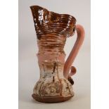 Simon Carroll large earthenware jug dated 2004: Displaying a spiral incised body, a waffle impressed