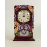 Moorcroft clock Pansy pattern: Measures 15cm x 10cm, with box. No damage or restoration.
