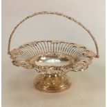 Silver footed fruit bowl: With ornate vine leaves edge & handle, hallmarked for Birmingham 1912,