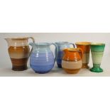 A collection of Shelley Harmony ware jugs & vases: Varying shapes, height of tallest 20cm. (6)