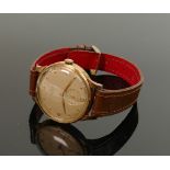 9ct gold Smiths Deluxe gents wristwatch: With leather strap.