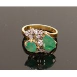 18ct gold ring set with diamonds & emeralds: Set with 10 diamonds and two emeralds.5.2g.