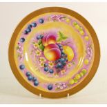 A Royal Worcester plate, gilded & decorated with fruit by Leaman, diameter 27cm: