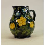 Modern Moorcroft jug: Some crazing, 15.5cm high.