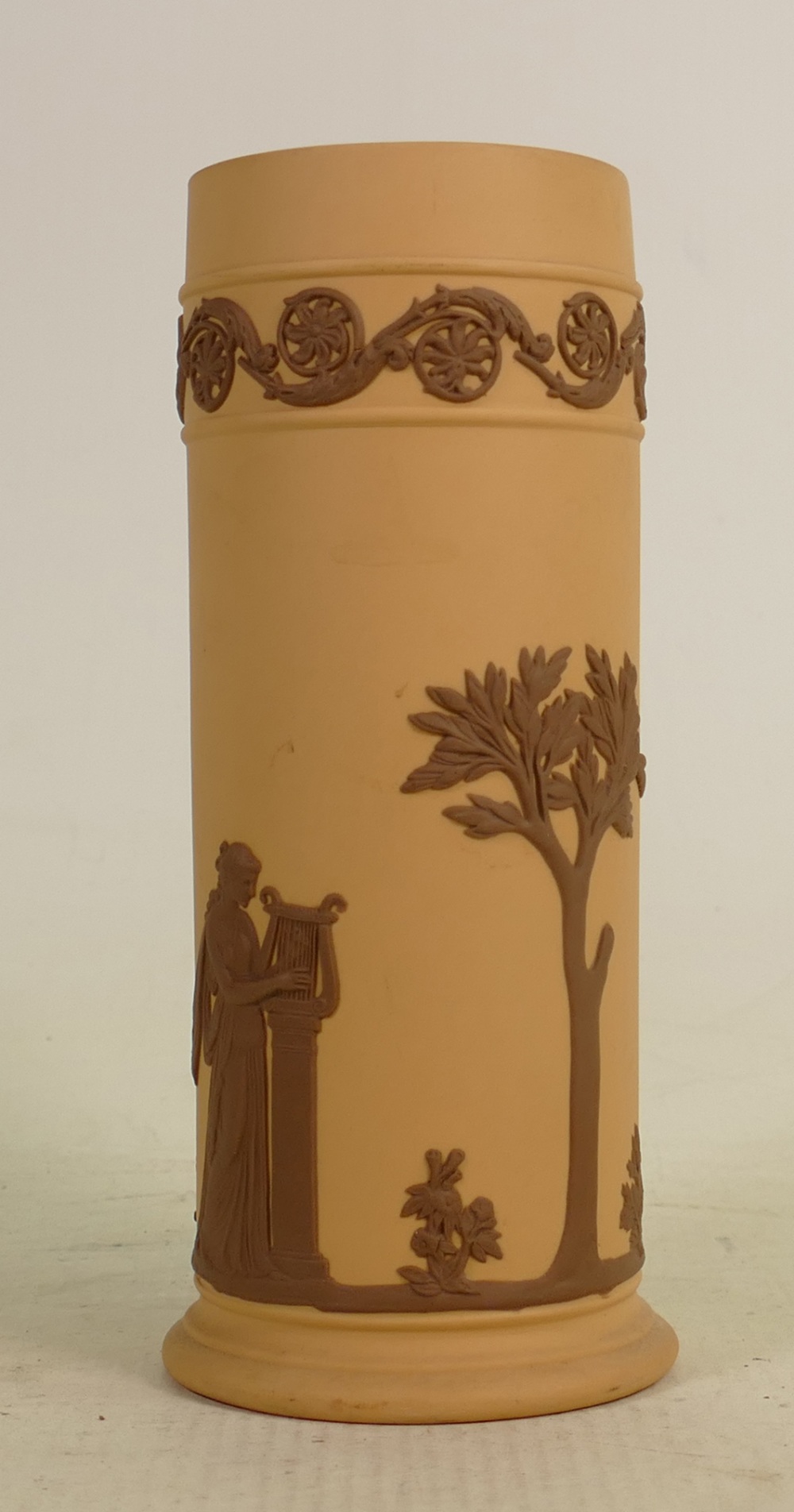 Wedgwood chocolate on cane Muse vase: Dated 1986, height 17cm.