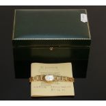 Ladies 9ct gold Sovereign wristwatch with 9ct gold strap: 10.7g, boxed.