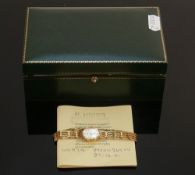 Ladies 9ct gold Sovereign wristwatch with 9ct gold strap: 10.7g, boxed.