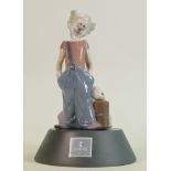 Lladro figure of a clown with a puppy model 6245: Signed & dated 11-6-97, on Lladro Society stand.