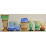 A collection of Shelley Harmony ware jugs & vases: Varying shapes, height of tallest 25cm. (7)