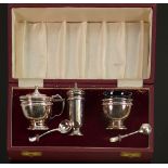 Cased silver 3 piece cruet set: Weighable silver 116.4g, one liner missing, 2 silver spoons