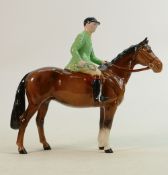 Beswick rare model of a huntsman in green jacket: On a brown horse, made for the Beaufort Hunt.