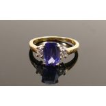 18ct gold ring set Tanzanite & diamonds: An expensive ring when purchased new, the tanzanite is