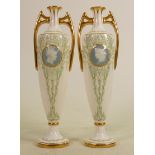 A pair of Minton pate-sur-pate twin handled vases: Decorated portrait panels by Albion Birks, the