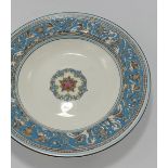 Wedgwood Blue Florentine pattern dinner ware to include: Cutlery, rimmed bowls, tureen, dinner