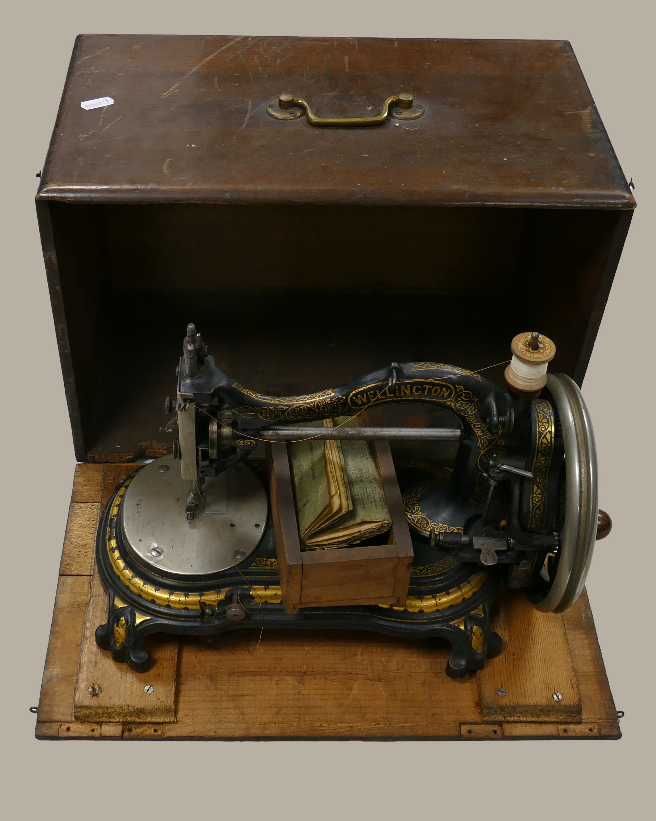 19th century Bradbury & Co Wellington sewing machine in good condition: In wooden case with original