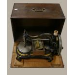 19th century Bradbury & Co Wellington sewing machine in good condition: In wooden case with original