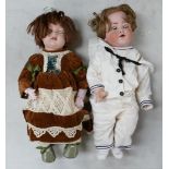 Large pottery headed English doll marked: D.P.C 67-12 Regina, height 58cm together with similar item