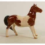 Beswick Skewbald girls pony 1483: (Ear tip & back leg restored).