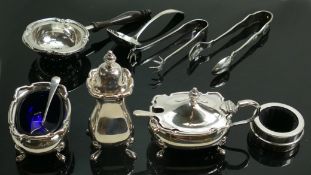 A selection of various silver items: Including salts, tongs, spoons etc., 356g.