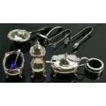 A selection of various silver items: Including salts, tongs, spoons etc., 356g.