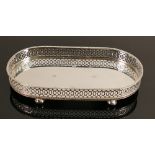 Modern silver galleried oblong oval small tray or salver: Weight 138.6g. Measures 16.5cm x 9cm