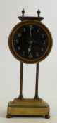 Watson Clock Company Kee-less gravity clock in brass with visible escapement: The movement falling