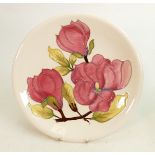 Moorcroft plate Magnolia pattern: Measures 23cm. With box. No damage or restoration.