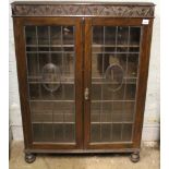 Early 20th Century glazed oak bookcase: 122cm high x 98cm wide x 28cm deep
