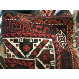 A large Indian wool rug/floor covering: approx 3.1m x 2m.