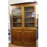 Impressive Edwardian oak bookcase: Storage base below with glazed bookcase above. 144cm wide x 240cm