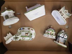 A collection of Coalport China Cottages: some with damage noted (7).