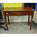 Mahogany side table: with single drawer, raised on bobbin supports, 92cm in width.