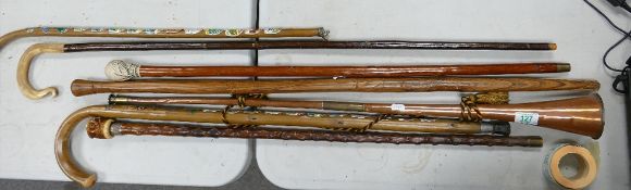 A collection of Walking Sticks: Staffs, Shepherds Crook, copper hunting horn etc(7)