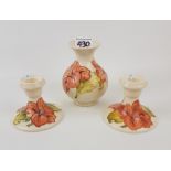 Moorcroft Hibiscus pattern vase (13cm): together with 2 candlestick holders (3).