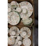 A large collection of Minton Haddon Hall patterned tea & dinner ware to include: teapots, dinner