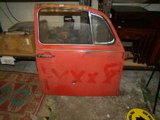 A 1960's VW Beetle drivers side door: red.