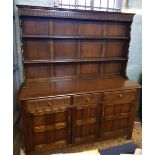 Oak 20th century dresser sideboard: 3 drawers and 3 cupboard doors with plate rack above, 153cm