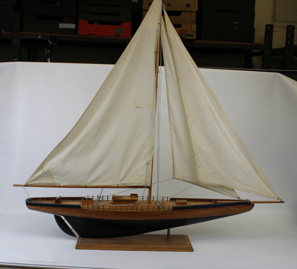 Vintage model wooden sailing boat/clipper on stand: overall height 106cm.