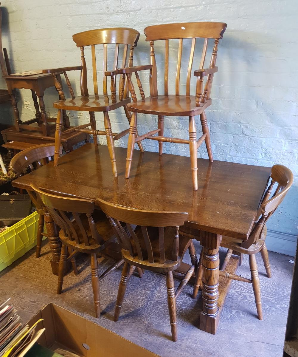 Oak refectory table: with 4 dining chairs and 2 carvers, size of table top 153cm x 80cm.