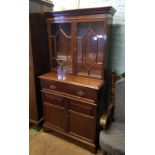 Mahogany glazed bookcase on 2 drawer/2 door base: 94cm wide, 51cm deep and 186cm high.