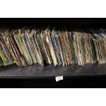 A collection of 45 rpm singles 1960's/1970's/1980's mixed genres: viewing advised.